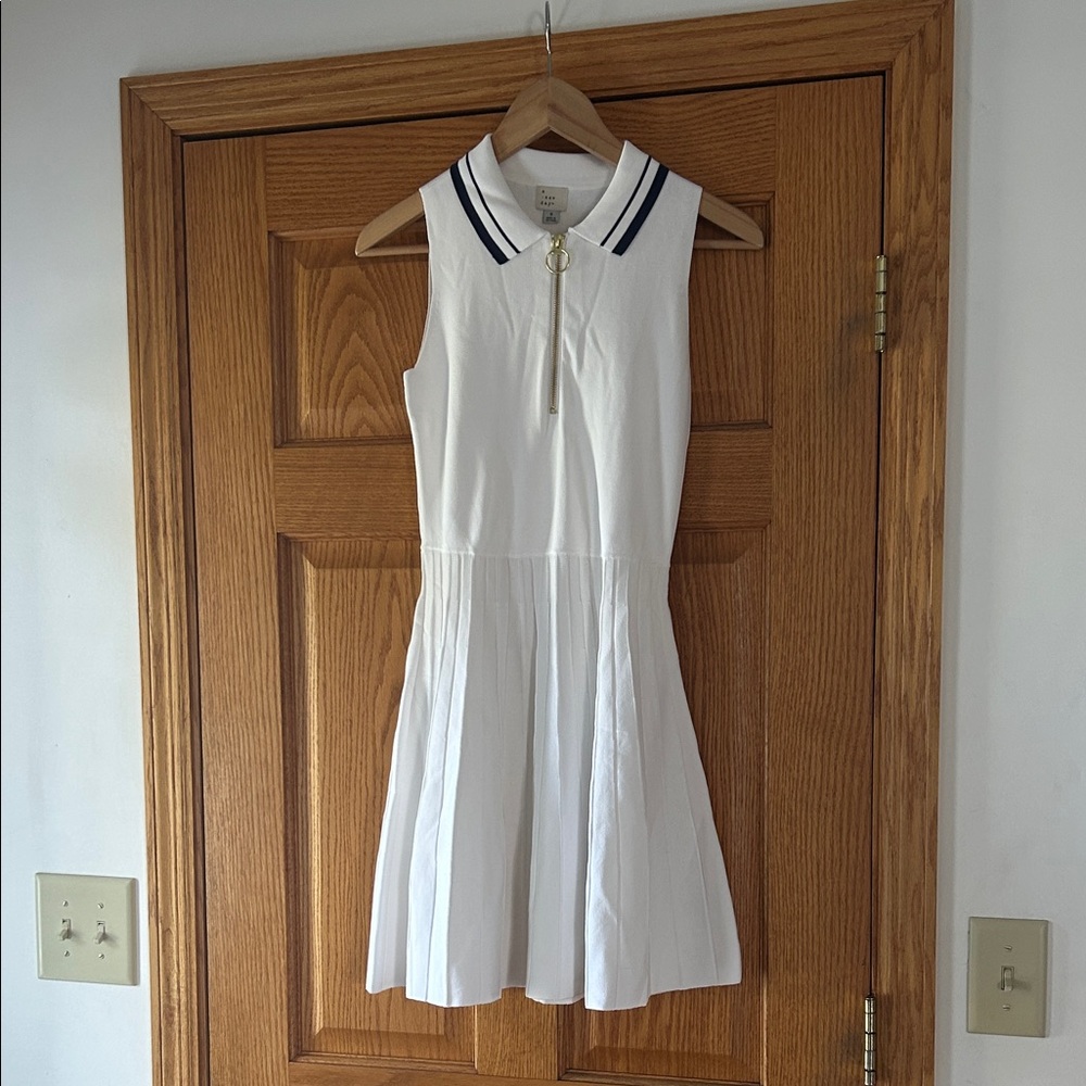 White Sleeveless Polo Dress with Navy Trim and gold zipper.  NWT